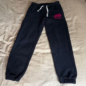 Roots Girls Original Sweatpants in Salt & Pepper Gray Fabric with Pink Logo.